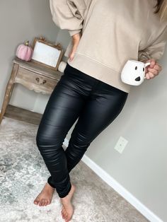 Your fall wardrobe can't be complete without a pair of faux leather pants! Super stretchy, high-rise fitted skinny leg; pair with a chunky boot or casual sneaker and your favorite oversized graphic tee & shacket 👏🏼 Model is 5’4” and wearing a size Large (typically size 9)Sizing: S: 0-4 M: 6-8 L: 10-12 XL: 14-16 Material: Faux Leather Pants For Streetwear In Fall, Faux Leather Pants For Fall Streetwear, Fall Faux Leather Pants For Streetwear, Fall Streetwear Cargo Pants, Fall Streetwear Faux Leather Pants, Fall Streetwear Pants, Fall Faux Leather Streetwear Pants, Fitted Leather Pants For Fall Streetwear, Trendy Winter Leather Pants For Streetwear