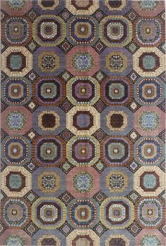 a multicolored rug with circles and squares on the center, in various colors