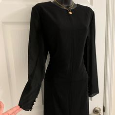 Ursula Of Switzerland Womens Black Dress Button Long Sleeve, Nice Dress For Cocktail Or Party. Measurements: Bust: Approx. 21 Inch. Waist: Approx. 18.5 Inch. Hips: Approx. 21 Inch. Length: Approx. 42 Inch. Nwt. Please See Photos! Thank You For Looking! Black Dresses With Side Buttons For Work, Black Dress With Side Buttons For Work, Black Workwear Dress With Side Buttons, Black Long Sleeve Dress With Covered Buttons, Fitted Formal Dress With Side Buttons, Formal Dresses With Side Buttons, Elegant Evening Dresses With Side Buttons, Black Sheer Sleeves Dress For Work, Black Dresses With Sheer Sleeves For Work