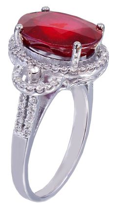 14K WHITE GOLD, 6.50CTW OVAL RUBY WITH ROUND CUT DIAMONDS, ART-DECO PRONG SET STYLE RING A STUNNING DESIGN, WITH A BEAUTIFUL OVAL SHAPED FACETED CUT RUBY (filled) WITH SUPERB LUSTER COLOR AND LIFE. THIS BEAUTIFUL & HUGE (JUST LOOK AT THE PICS) 6.00CT OVAL CUT RUBY IS SET ON A HIGHLY DETAILED FILIGREESETTINGA BEAUTIFUL RUBY WITH AN AMAZING COLORTotal weight is 6.50ct. TO WATCH A LIVE VIDEO OF THIS STUNNING RING PLEASE GO TO THE YOUTUBE LINK BELOW:https://youtu.be/veOd7XlYXdQTotal weight is 6.50ct Luxury Oval Ruby Ring For Anniversary, Dazzling Oval Ruby Ring With Prong Setting, Classic White Oval Ruby Ring, Elegant Oval Ruby Ring With Diamonds, Elegant Oval Ruby Ring With Vvs Clarity, Dazzling Oval Ruby Ring With Halo Setting, Dazzling Oval Ruby Wedding Ring, Oval Diamond Ring With Accent Stones For Formal Events, Oval Diamond Ring With Accent Stones For Formal Occasions