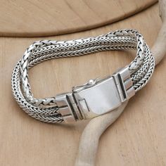 Balinese artisan Cahya Krisna puts all his expertise into a sterling silver creation with multiple braided strands. This wristband bracelet has a handsome aura thanks to its combination finish, perfect for formal or casual occasions.