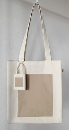 "This beautiful eco-friendly tote bag would be perfect for work, school, grocery shopping, picnic, traveling, and carrying your all thing everyday use. -Meticulously handcrafted, the heavyweight canvas tote comes in medium size with a comfortable carrying handle, a squared bottom, and an outside pocket for holding keys and smartphones. *Main fabric: 100% cotton heavyweight canvas. *Inner & Pocket fabric: 100% cotton medium-weight canvas.  *Dimensions:  -Regular Size: 14\"x13\"x2\"  -Handle Height: 12 1/2 ** Opening promotion! All totes will come with a mini tote keychain for no additional charge! **" Japanese Canvas Bag, Sewing With Canvas Fabric, Cotton Canvas Tote Bag, Cloth Bag Design Ideas, How To Make Tote Bags, Unique Tote Bag Design, Hand Bags For School, Cute Tote Bag Ideas, How To Make A Tote Bag