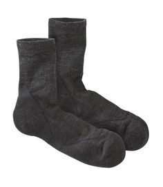 These fast-drying, breathable men's Darn Tough lightweight crew socks are ideal for hikers who need comfortable performance without the weight of extra cushioning. Redesigned with mesh panels on top of the foot for increased breathability. Micro Crew Height: A shorter take on the traditional crew height. Peeks just above the top of a standard hiking boot. 54% nylon/43% Merino wool 3% Lycra Spandex. New smooth ribbing upper reliably stays in place. Extended cushioning over the Achilles for comfor Lightweight Functional Socks For Outdoor, Slip-resistant Outdoor Socks, Functional Slip-resistant Outdoor Socks, Hiking Boot, Crew Sock, Mesh Panel, L L Bean, Mens Socks, Crew Socks