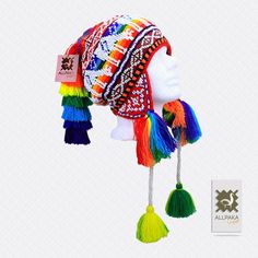 "This colorful Chullo is a handmade hat made by indigenous from the Andes in Pisac Cusco - PERU, woven in multicolored wool yarn, with ear flaps and decorated with beads all around, which are sewn one by one. This particular one has a design of the \"Andean Llama\",South American camelid from the Andean cultures. If laid flat, the Chullo alone is approximately 12\" long x 10.5\" wide. Including the pompoms on the bottom and all of the top, it measures from end to end 24\" approximately The CHULL Multicolor Hippie Cap, Multicolor Bohemian Hat, One Size Fits Most, Bohemian Multicolor Adjustable Hat, Bohemian Multicolor Hat, Multicolor Bohemian Hat, Colorful Bohemian Crochet Hat, Multicolor Bohemian Beanie Hat, Multicolor Bohemian Beanie, Bohemian Multicolor Beanie