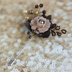 Leather flower lapel pin Pearl beads brooch is Handmade beaded brooch for Wedding and Evens.  Beaded flower brooch can be a beautiful Wedding boutonniere lapel pin. The elegant flower pin made with faux Pearl beads, Sunstone beads and seed beads.  The length of the leather flower lapel pin  is 4.0 inches   Leather floral pin  Diameter is approximately 2.0 inches Color - beige, khaki, brown Exquisite leather brooch is perfect men flower lapel pin for any clothes. Add class to your look with this handmade plant brooch! This branch flower pin/ beaded shawl pin can be a beautiful gift!  More brooches and pins can see here:  https://etsy.me/3eBaTnB Elegant Brooch Pins For Jewelry Making, Handmade Flower Brooches For Wedding, Elegant Flower Shaped Pins For Party, Wedding Brooches With Handmade Flowers, Elegant Flower Pins For Parties, Elegant Brown Formal Brooches, Elegant Flower-shaped Party Pins, Elegant Flower Shaped Party Pins, Elegant Handmade Lapel Pin For Formal Occasions