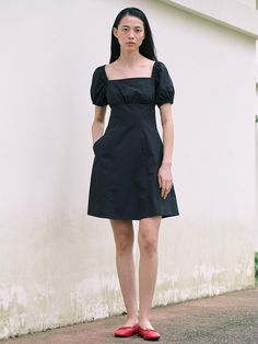 This is a trendy and feminine dress by kuho plus that is made out of high quality and sturdy material. With distinctive mood of the design and comfortable wear, you can style it for your casual daily outfit.- Shirring detail on the bodie- Square neckline and A line silhouette- Feminine, romantic, and casual mood Chic Black A-line Puff Sleeve Dress, Modern Fitted Cotton Dresses, Black Puff Sleeve Dress With Square Neck For Summer, Black Square Neck Cotton Mini Dress, Black Cotton Puff Sleeve Dress For Spring, Black A-line Puff Sleeve Dress For Spring, Black Cotton Mini Dress With Square Neck, Black Puff Sleeve Summer Dress For Day Out, Black Cotton Mini Dress With Puff Sleeves