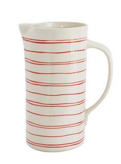 a red and white striped pitcher on a white background