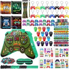 an assortment of game controllers and accessories including pens, markers, stickers, pencils