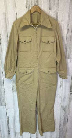 Good preowned vintage condition. There are no tags. Please see measurements in pictures. Not sure if mens or women’s. Seems like it could be for either. Zip front. Pockets on front. Big collar. Please see all pictures for details. Thanks for looking! Vintage Cotton Jumpsuits And Rompers For Work, Retro Long Sleeve Jumpsuits And Rompers For Fall, Retro Long Sleeve Jumpsuit For Fall, Vintage Long Sleeve Jumpsuits And Rompers For Work, Vintage Long Sleeve Jumpsuit For Work, Vintage Long Sleeve Jumpsuits And Rompers For Fall, Retro Spring Workwear Overalls, Vintage Jumpsuits And Rompers For Workwear, Vintage Jumpsuits And Rompers With Pockets For Spring