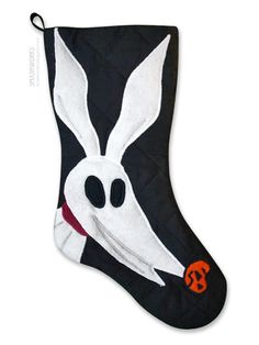 a black and white stocking with a rabbit face on it