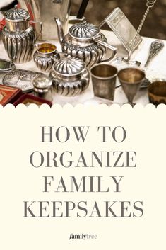 a table with silver teapots and other items on it that says how to organize family keepsakes