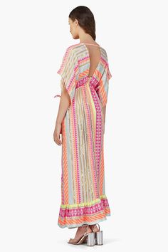 Pure cotton all over stripe Maxi Length Dress Relaxed Kaftaan Sleeves V- neck and Drawstring Necktie Elasticated empire neckline waist and a Line silhouette Bottom Ruffle Hemline The Fluorescent Striped Maxi Dress is a vibrant and versatile piece that exudes effortless summer style. Crafted from pure cotton, this maxi dress features an all-over stripe pattern in eye-catching fluorescent hues, adding a playful pop of color to your wardrobe. The relaxed fit silhouette ensures comfort and ease of m Bohemian Striped V-neck Maxi Dress, Striped Maxi Dress For Beach Cover-up, Striped Beach Maxi Dress, Lined, Striped Lined Maxi Dress For Beach, Striped Lined Maxi Dress For The Beach, Striped Maxi Dress For Daywear, Striped Lined Beach Dresses, Striped V-neck Lined Dresses, Striped V-neck Dress For Daywear