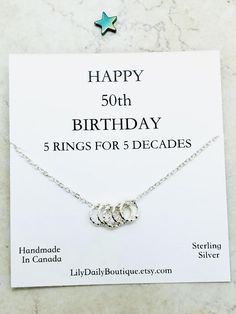 Happy 50th birthday gifts - Five rings represent five decades, this beautiful elegant necklace comes with 5 rings, where each ring represent a decade - this is the perfect birthday present for that someone special celebrating their 50th.Other decade necklaces are also available at checkout:  Happy 20th, 30, 40, 50, 60, 70, 80, 90This eternity necklace features four simple silver plated open circles, suspended from a delicate but strong silver cable chain.  This minimal yet beautiful karma neckla Crystal Tassel Necklace, August Birthstone Necklace, Five Rings, Eternity Necklace, Asymmetrical Necklace, Gifts For Best Friend, Meaningful Necklace, Essential Oil Jewelry, Karma Necklace