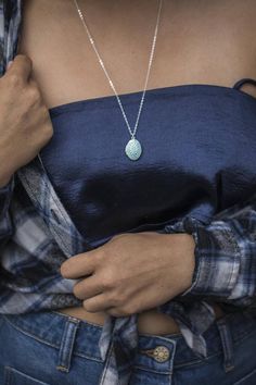 This adorable oval blue locket has a gorgeous aqua tone and verdigris design.  The necklace can be short, mid range or long, your choice at checkout.  The locket has been sealed to be water resistant.  Also available in aqua blue and silver!DETAILS:-Pendant measures 3/4" in height -Photo interior is 3/8" by 5/8" ………………………………….P H O T O S :#2: 24" length#3: 24" length#4: 24" length#6: 20" chain layered with the Small Personalized Filigree Locket (16"):     https://www.etsy.com/listing/168284808#7 Small Gold Locket, Aqua Pendant, Gold Locket Necklace, Oval Locket, Bird Necklace, Gold Locket, Necklace Long, Blue Necklace, Shabby Chic Style