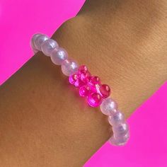 Adorable Jumbo Gummy Bear Shimmer Bracelet. Made using Hot Pink Acrylic Gummy Bear, 8mm Purple Shimmer acrylic beads, on 1mm durable elastic cord. You will receive (1) Bracelet ✨Sizing Siggestions✨ * Child 2-4yrs 5.0"   * Child 5-7yrs 5.5"  * Child 8-10yrs 6.0" (also fits XS Adult sz) * Adult S 6.5"  * Adult M 7.0" * Adult L 7.5" * Adult XL 8.0" * Adult XXL 8.5" check out my other gummy bear accessories, earrings, phone strap, phone charms!  free shipping at $35 If you have any questions, feel f Novelty Pink Jewelry With Round Beads, Adjustable Pink Kawaii Jewelry, Pink Hypoallergenic Friendship Bracelets For Birthday, Hypoallergenic Pink Friendship Bracelets For Birthday, Trendy Plastic Friendship Bracelets As Gift, Pink Beaded Bracelets For Party Favors, Pink Plastic Jewelry For Birthday, Adjustable Pink Wristband For Birthday, Hypoallergenic Plastic Bracelets For Gift