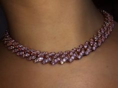 Iced Out Women Choker Necklace Rose Gold Metal Cuban Link Full With Pink Cubic Zirconia Stones Chain Jewelry This listing comes with 1. The pink Cuban rose gold choker 9mm thickness 2. Pink Tennis chain choose length below LIMITED EDITION will ship out in 1-3 days if in stock.if out of stock will ship 3-10 days. This is probably one of the most popular and trendy chains available. If you take a look at your favorite I guarantee a Diamond Cuban Link chain is part of their collection and once you have it, you understand why this chains continues to turn heads and bring attention. Let the light hit and its over The Cz Diamond Miami Cuban Link chain is finely crafted by hand using high quality 18k Gold Plating and then each cuban link is flooded with stunning Cz diamonds sun glasses may be req Rose Gold Chain Jewelry For Party, Party Cuban Link Necklace With Adjustable Chain, Trendy Rose Gold Chain Jewelry, Trendy Rose Gold Cubic Zirconia Jewelry, Trendy Cuban Link Jewelry Gift, Pink Bling Necklace For Gift, Trendy Pink Gold Jewelry For Party, Trendy Pink Cubic Zirconia Jewelry, Trendy Rose Gold Jewelry With Adjustable Chain