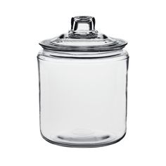 a glass jar with a lid on a white background