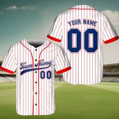 a baseball jersey with the name and number on it in front of an empty stadium