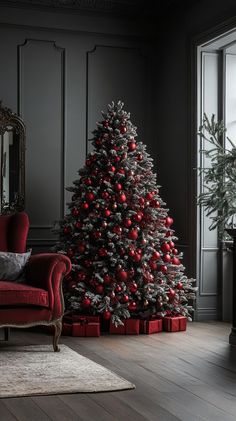 A beautifully decorated Christmas tree with red ornaments and wrapped presents, set in an elegant dark interior—perfect for a winter or holiday-themed wallpaper. Christmas Tree Wallpaper, Elegant Christmas Trees