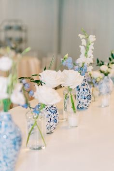 Classic Southern White and Blue Wedding Reception with Chinoiserie China Vases and Simple White Floral Centerpieces Blue And White Faux Flowers, Wooden Table Decorations Wedding, Chinoiserie Chic Wedding Decor, Blue And White Wedding Theme Receptions, Long Hydrangea Centerpiece, Blue And White Vintage Wedding, Blue And White Christmas Wedding, White And Blue Engagement Party, Blue And White Wedding Table Flowers