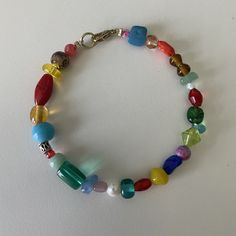 Handmade rainbow beaded bracelets! Depop Photography, Craft Things, Chunky Necklaces, Evil Eye Earrings, Rainbow Beads, Pretty Jewelry, Eye Earrings, Themed Jewelry, Glass Beaded Bracelets