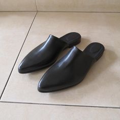 "Flat Leather Shoes Black Mules, Leather Mules, Women Shoes, Leather Sandals, Slip On, Black Pointed Mules, Women's Closed toe Sandals ------------------------------ We use the finest leather and the most comfortable shoe shape. We use a manufactured durable sole so that you can enjoy the most out of these gorgeous shoes. All of our shoes are handmade, created with careful attention to comfort, detail and style. ------------------------------ Sandals Details: * Color - Black * Upper Materials: L Black Leather Slip-on Mules, Leather Pointed Toe Slip-on Sandals, Leather Sandals With Pointed Toe And Slip-on Fit, Black Closed Toe Mules With Leather Lining, Leather Slip-on Sandals With Pointed Toe, Black Pointed Toe Mules With Rubber Sole, Leather Sandals With Slip-on Fit And Pointed Toe, Black Sandals With Rubber Sole And Almond Toe, Black Closed Toe Sandals For Business