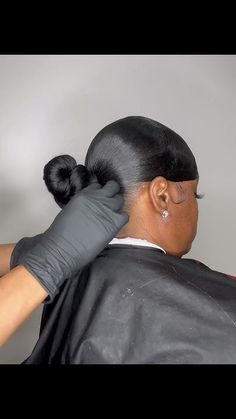 Ninja Knot Bun With Weave, Slick Back Top Knot Bun, Low Bun With Braiding Hair, Ninja Bun With Braiding Hair, How To Do A Ponytail With Braiding Hair, Low Knot Bun With Swoop, Knot Bun With Braiding Hair, Knot Ponytail Black Hair, Top Notch Bun