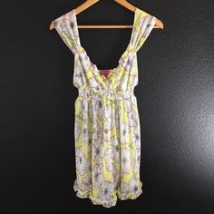 Never Worn Betsey Johnson Intimate Yellow Nightgown Babydoll Chemise With Purple White Floral Design Ruffle Hem Little Embroidered Flowers On Shoulder Straps. Cute Slip Is Just Like A New Without Tags Size Small! Shoulder Strap: 6" Bust: 24" Waist: 24" Shoulder To Hem: 29.5" Cute V-neck Summer Sleepwear, Summer V-neck Sleepwear With Ruffles, Summer V-neck Ruffled Sleepwear, Cute Yellow Summer Sleepwear, Yellow Summer Sleepwear, Yellow Floral Print Sleepwear For Summer, Cute Sleeveless Sleepwear With Floral Print, Summer Ruffled V-neck Sleepwear, Yellow Spring Sleepwear For Vacation