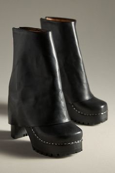 Leather upper, insole Rubber sole Pull-on styling Imported | Bootcut Foldover Boots by Swedish Hasbeens in Black, Women's, Size: 40, Leather/Rubber at Anthropologie Designer Leather Boots With Stacked Heel, Leather High Heel Wedge Boots With Lug Sole, Designer Leather Platform Boots With Lug Sole, Leather Platform Boots With Lug Sole And Pointed Toe, Leather High Ankle Wedge Boots With Lug Sole, Leather High Ankle Wedge Boots For Work, Leather High Ankle Platform Boots With Stacked Heel, Designer Boots With Stacked Heel In Medium Width, Designer Boots With Stacked Heel