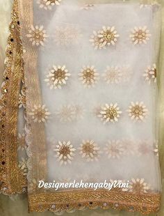 Custom made net dupatta perfect for all festive and wedding occasions. Length- 2.50 meters Best suited with anarkali and lehenga choli. Can also be used for gifting purposes in wedding parties and mehendi & haldi ceremonies. Manufacturing time- 5 days. Cream Lehenga With Dupatta For Diwali, Party Lehenga With Dupatta In Cream, Elegant Net Anarkali Set For Festivals, Party Cream Lehenga With Dupatta, Cream Anarkali Set With Lace Work For Wedding, Organza Dupatta With Lace Work In Traditional Drape, Organza Dupatta With Traditional Lace Work, Organza Dupatta With Lace Work, Cream Lehenga With Dupatta For Festivals