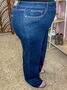 Raw hem, straight leg/mom jean, deep dark denim Material content: cotton, polyester, rayon, elastic-poly, and spandex Material feel: stretchy denim Stephanie is 5'6 and wearing the 20W. This is her true Judy Blue size. Her measurements are 50"/43"/54" for bust/waist/hips. Material measurements (waist/hips/rise/inseam): 14W: 34"/46"/12"/33" 16W: 36"/48"/12"/33" 18W: 38"/50"/12.5"/33" 20W: 40"/52"/12.5"/33" 22W: 42"/54"/12.5"/33" 24W: 44"/56"/12.5"/33" 82512 Denim Material, Mom Jean, Dark Denim, Flare Jeans, The Sea, Mom Jeans, Straight Leg, How To Wear