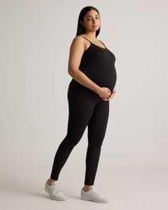 Experience unparalleled comfort with the Recycled Knit Spaghetti Strap Tank Unitard, designed to grow with you through every stage of pregnancy. Featuring a soft, breathable fabric and seamless construction, this bodysuit offers both style and support. Perfect for lounging or layering, it provides gentle support for your bump while maintaining a sleek, stylish look.  | Quince | Women's Recycled Knit Maternity Spaghetti Strap Tank Top Unitard in Black, Size Medium, Recycled Polyester Maternity Unitard, Spaghetti Strap Tank Top, Pregnancy Stages, Pre Pregnancy, Womens Maternity, Eco Conscious, Sleek Design, Sustainable Fashion, Breathable Fabric