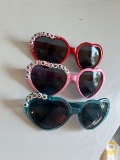 Cute heart shaped sunglasses inspired by Sabrina Carpenter! Great for going to a concert, party, Halloween, or even as party favors to fans of all ages! If you don't see a saying you would like on the glasses feel free to enter a personalization to them! If selecting CUSTOM NAME please enter the name in personalization. 😊 Sabrina Carpenter Sunglasses, Fun Sunglasses As Valentine's Day Gift, Fun Sunglasses For Valentine's Day Gift, Fun Heart Shaped Adjustable Sunglasses, Playful Party Sunglasses Personalized, Trendy Personalized Sunglasses For Birthday, Trendy Personalized Party Sunglasses, Playful Personalized Sunglasses For Party, Personalized Playful Sunglasses For Party