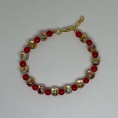 Handmade 7 In Gold Wire Bracelet With A 1 In Extender Featuring Round Red And Gold Confetti And Smaller Round Red Beads! Red Confetti, Red Beads, Christmas Bracelet, Gold Confetti, Wire Bracelet, Handmade Gold, Red Bead, Gold Wire, Red And Gold