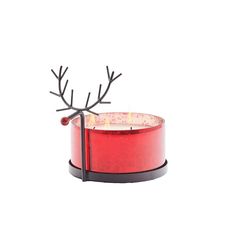 a red candle holder with antlers on it