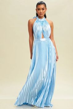 The "Satin Pleated Halter Maxi #Dress" in light blue is a stunning choice for anyone looking to exude a serene and #elegant aura. The dress's design features a high halter neck, tying at the back to reveal a graceful backless look, and a front cutout that adds a #modern touch. Its flowy pleated satin fabric enhances the overall appeal, making it move gracefully with each step. Casual Beach Wear, Halter Maxi Dress, Halter Maxi, Halter Maxi Dresses, Light Blue Color, Blue Satin, Halter Neckline, New Arrival Dress, Dream Dress