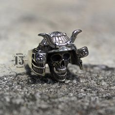 Handmade Rock n roll jewelry like you've never seen before. Grab yours NOW or cry later. Best attention to detail. Article name : GHOST WARRIOR RING Environmentally friendly metal made with passion and great attention to detail 🔨 Limited only 50 pcs will be produce : handmade samurai rings Very comfortable to wear daily and in any occasion 🖤💍 Shipped from Jakarta, Indonesia Standard shipping use USPS ( US Customers ) Singapore post ( Rest of the world ) Express shipping use DHL Express Note : Please put a phone number in a note for DHL Express, it needs to require. Office number or any number will be fine. Thank you for stoping by in my gallery. Really appreciate it. Don't hesitate to contact me anytime you need for any questions. Adjustable Skull Rings With Symbolic Style, Handmade Unique Metal Skull Ring, Adjustable Gothic Skull Ring Collectible, Adjustable Sterling Silver Skull Ring, Symbolic Metal Skull Ring For Collectors, Collectible Skull Ring For Halloween, Collectible Skull Rings For Halloween, Skull Shaped Symbolic Jewelry Stamped 925, Silver Symbolic Skull Ring For Halloween