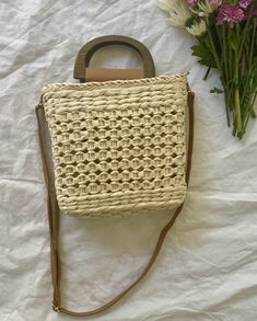 Our Ibiza straw crochet handbag is the perfect addition to your spring/summer wardrobe! This lightweight tote is a must for vacation! Lightweight Straw Woven Handbag Top handles and straps Materials: 100% Paper Straw Drawstring Opening-Polyester Lining Imported Approximately: 7x7.8 in Spring Braided Crochet Shoulder Bag, Cream Straw Bag With Braided Handles For Day Out, Braided Crochet Shoulder Bag For Summer, Summer Braided Crochet Shoulder Bag, Beige Braided Crochet Bag, Rectangular Shape, Spring Braided Crochet Tote Bag, Beige Crochet Bag With Handles For Spring, Summer Cream Crochet Bag For Day Out, Spring Open Weave Rectangular Shoulder Bag