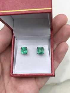 A classic pair of Asscher-cut green natural Colombian emerald gold studs 14K white gold. These earrings feature two lively, natural Colombian emeralds that are handset in a single four-prong setting. These stones were sourced by the best emerald mine in the world known as Chivor. They are comfortable to wear and come with secure back pieces. (Exceptional in color and style!) No two emeralds are perfectly alike, one emerald is slightly larger than the other. Embrace uniqueness :D Setting Style: S Luxury Emerald Earrings In Emerald Cut, Gia Certified Emerald Earrings For Formal Occasions, Luxury Octagon Gemstone Earrings, Octagon Gemstone Earrings For Anniversary, Formal Emerald Earrings With Prong Setting, Formal Emerald Gemstones With Prong Setting, Formal Octagon Gemstone Earrings, Classic Gia Certified Emerald Cut Gemstones, Classic Formal Emerald Gemstones