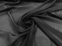 a black and white photo of a fabric