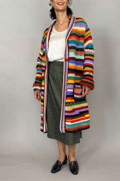 "Hand-knitted wool cardigan for women with pockets size M -L   Very colorful, this cardigan is very chic and funny. Fits M - L. Handmade silk virgin wool skirt you can order it and buy it from this shop: https://etsy.me/3DbQRvc. Exact measurements of the cardigan lying flat: length: 99 cm ( 38.97\")   sleeves length:   67 cm ( 26.37\" )                                                                                                                                                                                                                                         arm pit to arm pit  : 61 cm ( 24.01\" )                                                 shoulders : 46 cm ( 18.11\" )  The model is 170 cm (5'6),size M and  measurements are: bust 88 cm ( 34.64\"), waist 75 cm ( 29.52\"), hips: 1 Long Pink Skirt, Sell Dresses, Cardigan For Women, Wool Skirt, Pink Skirt, Wool Skirts, Printed Midi Dress, Wool Cardigan, Skirts With Pockets