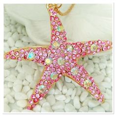 Beautiful Pink And Clear Rhinestone Encrusted Pendant On A 26” Gold Rope Chain. Pendant Measures 3” X 3”. New Pink Starfish Jewelry For Gift, Pink Rhinestone Necklace With Bling For Gift, Pink Rhinestone Bling Necklace For Gift, Pink Rhinestone Bling Necklace Gift, Pink Star Jewelry With Starfish Charm, Pink Star-shaped Jewelry With Starfish Charm, Pink Star-shaped Jewelry For Party, Pink Starfish Charm Jewelry, Starfish Necklace