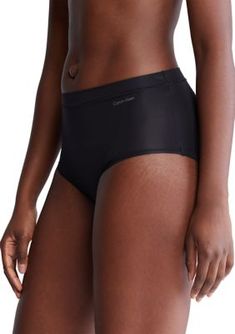 A core Calvin Klein high-rise brief, crafted from silky soft microfiber stretch for a smooth touch with added flexibility. Designed with a slim repeating logo elastic waistband for excellent recovery and a high-cut leg silhouette. | Calvin Klein Women's Ideal Micro High Rise Brief Panty, Black, Large Sleek Nylon Compression Bottoms, Sleek Compression Nylon Bottoms, Calvin Klein Black Activewear For Sports, Fitted Seamless Calvin Klein Bottoms, Sports Bottoms With Full Coverage And Soft Touch, Calvin Klein Seamless Micro-elastic Bottoms, Soft Touch Nylon Sports Bottoms, Nylon Sports Bottoms With Soft Touch, Sports Nylon Bottoms With Soft Touch