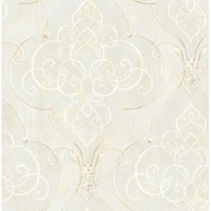 a white wallpaper with swirls and scrolls on it