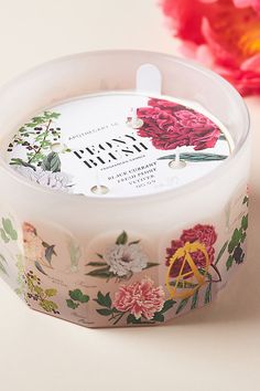 an empty container with flowers printed on it