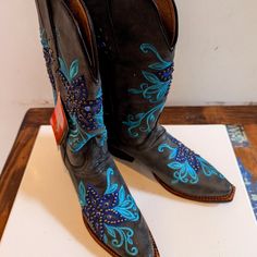 Nwt. Brown With Gorgeous Designs All Over. Leather. Blue Fitted Snip Toe Boots, Fitted Blue Snip Toe Boots, Fitted Blue Ankle Boots, Blue Snip Toe Boots For Fall, Blue Boots With Snip Toe For Fall, Blue Fall Boots With Snip Toe, Fitted Blue Almond Toe Boots, Blue Snip Toe Boots With Reinforced Heel, Blue Western Boots With Round Toe