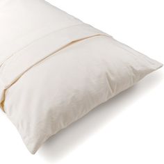 a white pillow on a white background