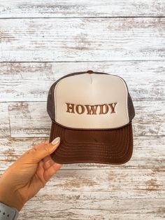 Howdy neutral trucker hat Brown Trucker Baseball Cap With Letter Print, Brown Trucker Hat With Letter Print And Flat Brim, Brown Trucker Hat With Letter Print, Adjustable Brown Trucker Hat With Letter Print, Brown Adjustable Trucker Hat With Letter Print, Western Brown Trucker Hat One Size, Brown Trucker Hat One Size Fits Most, Western Brown Trucker Hat, Brown Western Trucker Hat