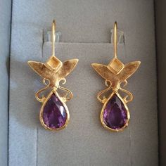 These Gold Amethyst earrings were designed in an antique inspired style, for a royal, romantic look. The Drop gold Amethyst earrings shine in a beautiful deep, see through purple color,  and are very elegant. Perfect teardrop earrings - a great gift for women and beautiful bridal earrings! Materials: The 14k gold earrings are available in 14k nickel free gold plating OR sterling silver.  The Gold Amethyst earrings are also available in 9k OR 14k Solid gold. The gold teardrop earrings were carefu Earrings Teardrop, Birthstone Earrings, Earrings Purple, Great Gifts For Women, Purple Earrings, Antique Inspiration, Birthstone Earring, Earrings Drop, Amethyst Earrings