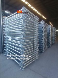 several metal racks stacked up in a warehouse